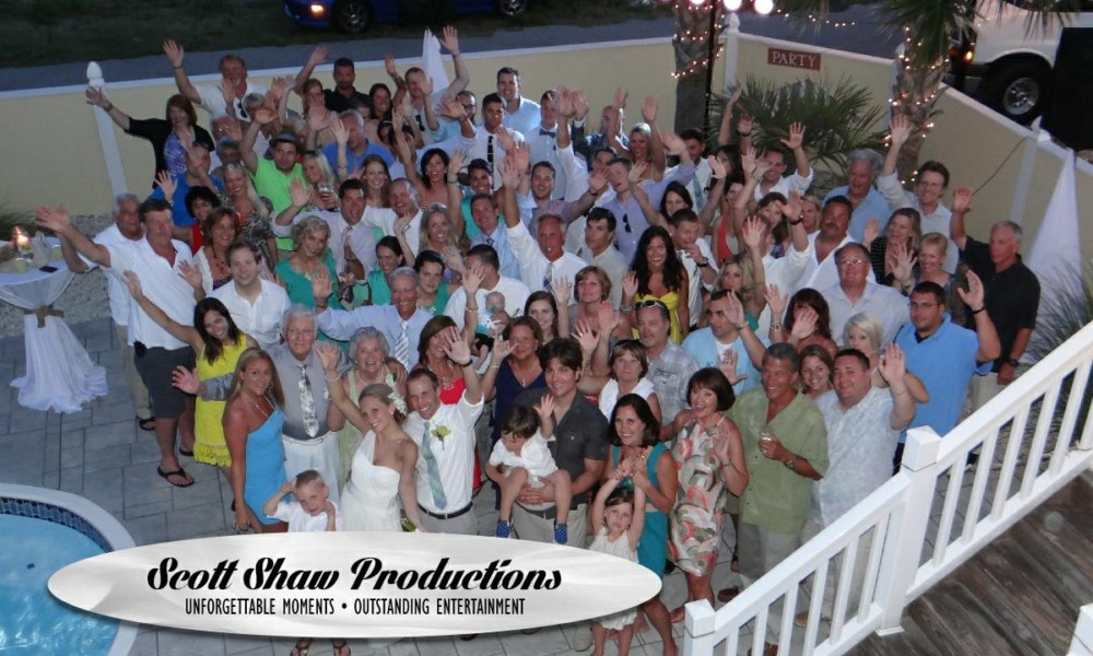 A Group Photo By The Pool At The Wedding Reception Another fun group photo at the wedding reception