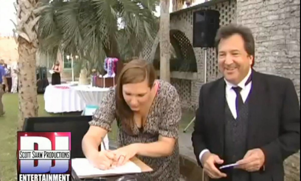 DJ Scott Shaw Taking Song Requests A request from a wedding guest for DJ Scott Shaw